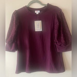Elbow length sleeve top